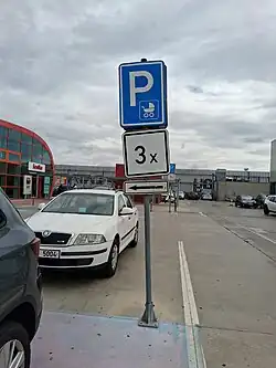 Reserved parking space for persons with stroller (road sign in the Czech Republic)