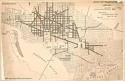 A map of Washington D.C., in 1884, with some roads in marked as paved in grey