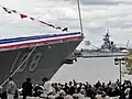 USS Wayne E. Meyer at her commissioning with the USS New Jersey in the background