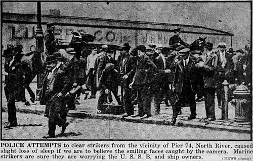 Caption reads, Police attempts to clear strikers from the vicinity of Pier 74, North River, caused slight loss of sleep if we are to believe the smiling faces caught by the camera. Marine strikers are sure they are worrying the U.S.S.B. and ship owners.