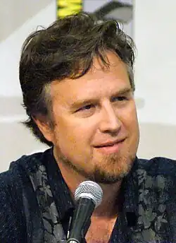 Dan Povenmire grinning