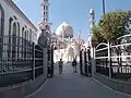 A view of the mosque through a gate