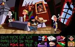 A horizontal rectangular video game screenshot that is a digital representation of a domestic room. Four characters stand around a large table in the middle of the room. A list of words and icons are below the scene.