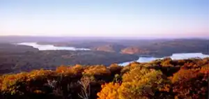 Image 7Western Maryland is known for its heavily forested mountains. A panoramic view of Deep Creek Lake and the surrounding Appalachian Mountains in Garrett County. (from Maryland)