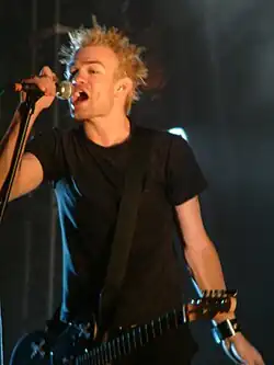 A man singing into a microphone