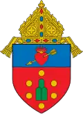 The original coat of arms as designed by Bishop Mariano Madriaga