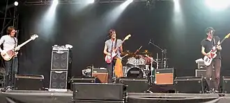 Dirty Pretty Things performing at the Øya Festival in 2008. From left: Didz Hammond, Carl Barât, Gary Powell (on drums), Anthony Rossomando