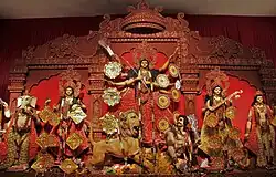 Durga Puja is a multi-day festival in Eastern India that features elaborate temple and stage decorations (pandals), scripture recitation, performance arts, revelry, and processions.[77]