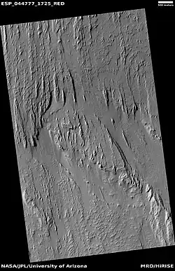 Wide view of yardangs, as seen by HiRISE under HiWish program Location is Memnonia quadrangle.