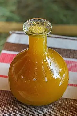 Tej A honey wine, fermented with gesho leaves and twigs, often enjoyed during celebrations.