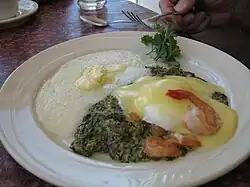 Eggs Sardou with grits and shrimp