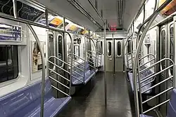 The interior of an R142A car on the 4 train.