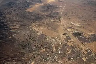 Aerial view of southwestern Henderson (left) and Enterprise (right) with Interstate 15 in between.