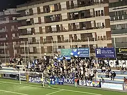 CE Europa's supporter group Eskapulats in a match in 2023-24.