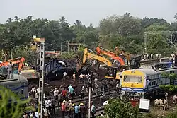 Excavators used to clear the tracks in the aftermath
