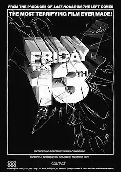 "Friday the 13th" in large block letters that appear to be crashing through breaking glass against a dark backdrop.
