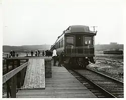 Passengers boarding the first westbound run of the Cannonball at Montauk station