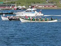 Image 10Kappróður is the Faroese word for rowing competition in wooden Faroese rowing boats. There are 7 regattas held around the islands every summer, where boats in different sizes compete. Here is the largest boat type 10-mannafør. (from Culture of the Faroe Islands)
