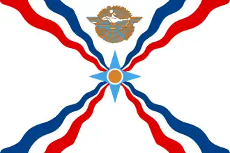 The star symbol of Shamash with wavy rays used as a symbol of the Assyrian people in the Assyrian flag.