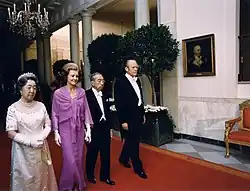 President of the United States Gerald Ford, First Lady Betty Ford, Japanese Emperor Hirohito and Empress Nagako (the men in white tie) during a state dinner (1975)
