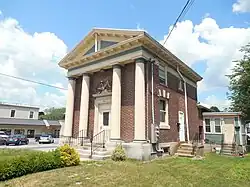 Former bike shop that was repurposed to a barbershop in Plainfield Village