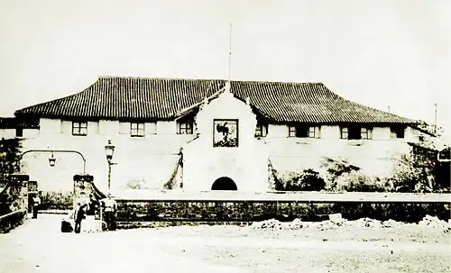 The front structure of Fort Santiago in Manila with tiled roof before it was destroyed by the earthquake of 1880.
