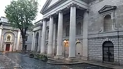 Foster Place entrance and portico in 2024. This entrance is also sometimes referred to as the House of Commons entrance.