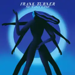 An all-black humanlike figure with a white face, long flowing hair, six arms, and four legs, stood in front of a dark blue background with a light blue ring on it.