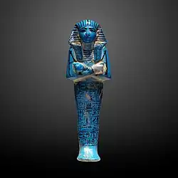 Figure of a servant from the tomb of King Seth I (1244–1279 BC). The figure is made of faience with a blue glaze, designed to resemble turquoise.