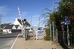 Access to the station is near the level crossing.
