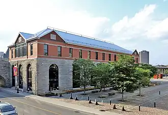 Exterior of a white and brown brick building