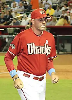 A man in a baseball uniform