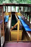 The interior of a glass-bottom boat
