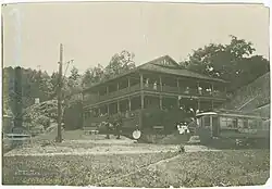 Excursion train to the Glenwood Inn. The banner on the trolley says "Concert at Glenwood". Trolley is stopped (end of route) before starting back to Hornellsville. Note that the car is smaller: only 6, rather than 8, windows on each side.