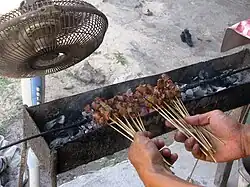Sate kambing prepared using goat meat