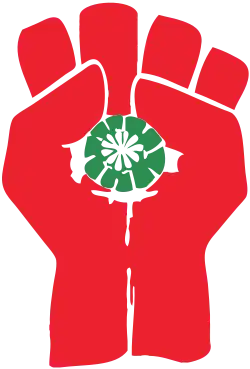 A red fist with thumbs on both sides clutches a peyote button.