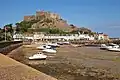 The castle of Mont Orgueil dominates village and harbour of Gorey