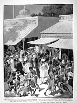 Drawing, titled "Famine in India," from The Graphic, February 27, 1897, showing a bazaar scene in India with shoppers, many of whom are emaciated, buying grain from a merchant's shop.
