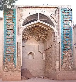 Great Mosque of Herat: Ghurid entrance (iwan) with remains of Ghurid inscriptions. 1200–1201 CE.[98]