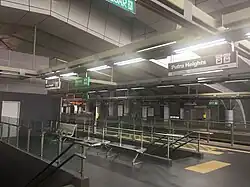 Signboards at this station are shown in grey, unlike most other stations, to show that it belongs to two lines, similar to the  KJ31  SB7  USJ 7 station on the Kelana Jaya Line