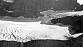 Grinnell Glacier (foreground) connected to The Salamander Glacier (upper right) as photographed in 1911