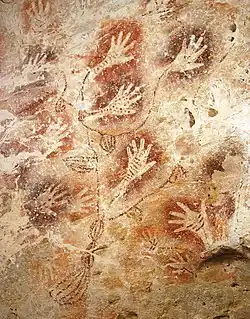 Image 2Hand stencils in the "Tree of Life" cave painting in Gua Tewet, Kalimantan, Indonesia (from History of painting)