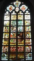 Stained glass window of the Dutch maiden was made in 1877 and donated by the Nederlandsche Maatschappij voor Nijverheid en Handel for their 100th anniversary