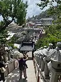 The narrow walkway down to the temple