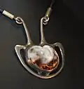 Pendant in silver, with shell