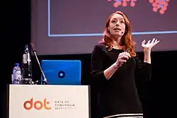 Hannah Fry speaking at a conference, 2017