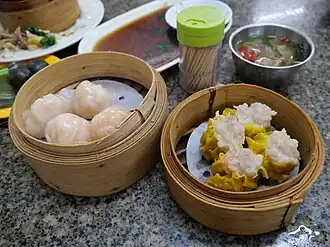 Har gow and shumai, two common dim sum dishes cooked in steamers