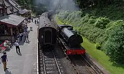 Hunslet Austerity Repulse runs around its train at Haverthwaite in 2013