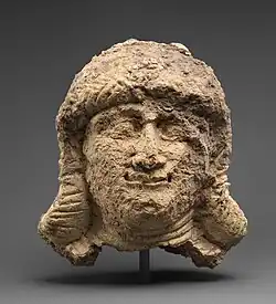 Female head; circa 2000-1600 BC; ceramic; 18 x 12.7 cm; Metropolitan Museum of Art (New York City)