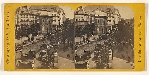 A sterioscopic photograph of the Porte Saint-Martin in Paris by Hippolyte Jouvin.